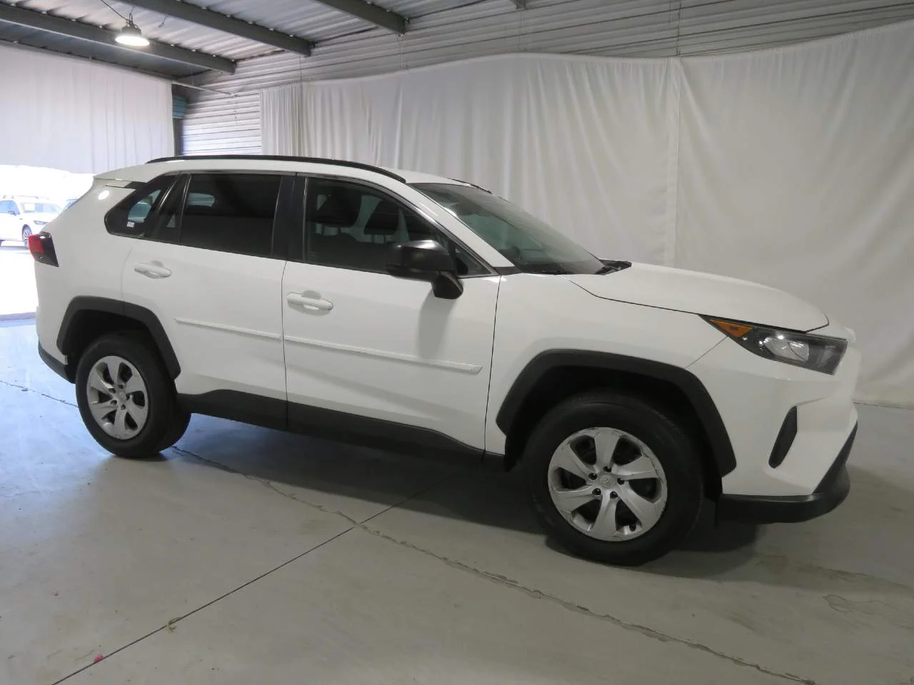 Used 2019 Super White Toyota LE image 7