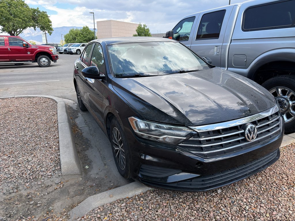 Used 2021 Black Uni Volkswagen SE image 3