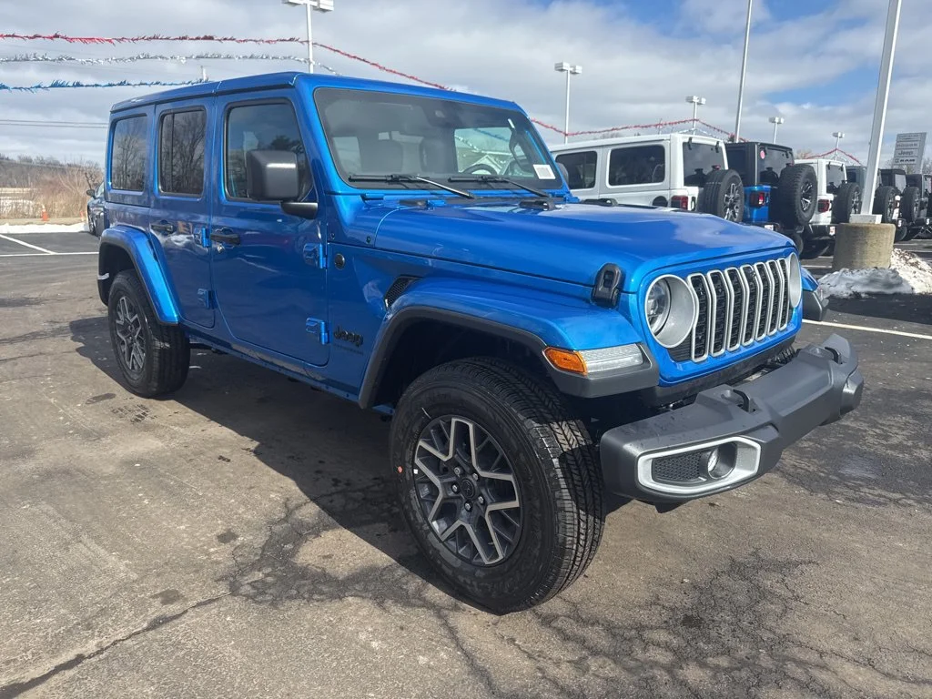 Used 2025 Blue Jeep Sahara image 1