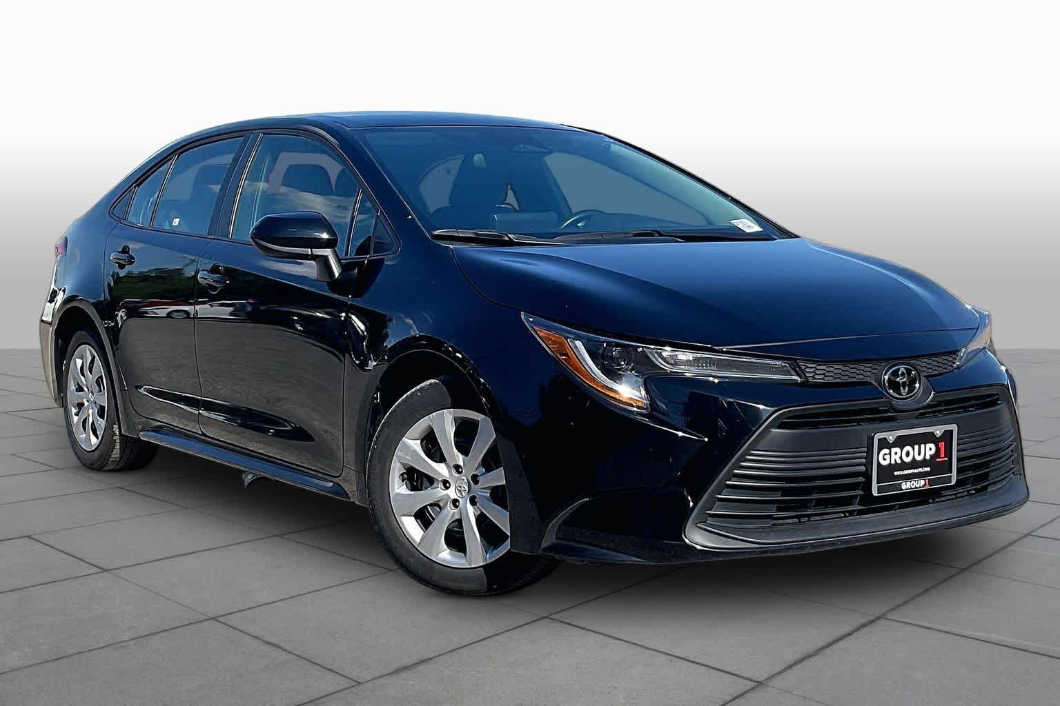 Used 2025 Midnight Black Metallic Toyota LE image 3