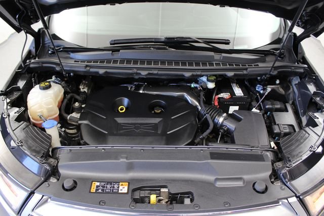 Used 2016 Magnetic Metallic Ford SE image 31
