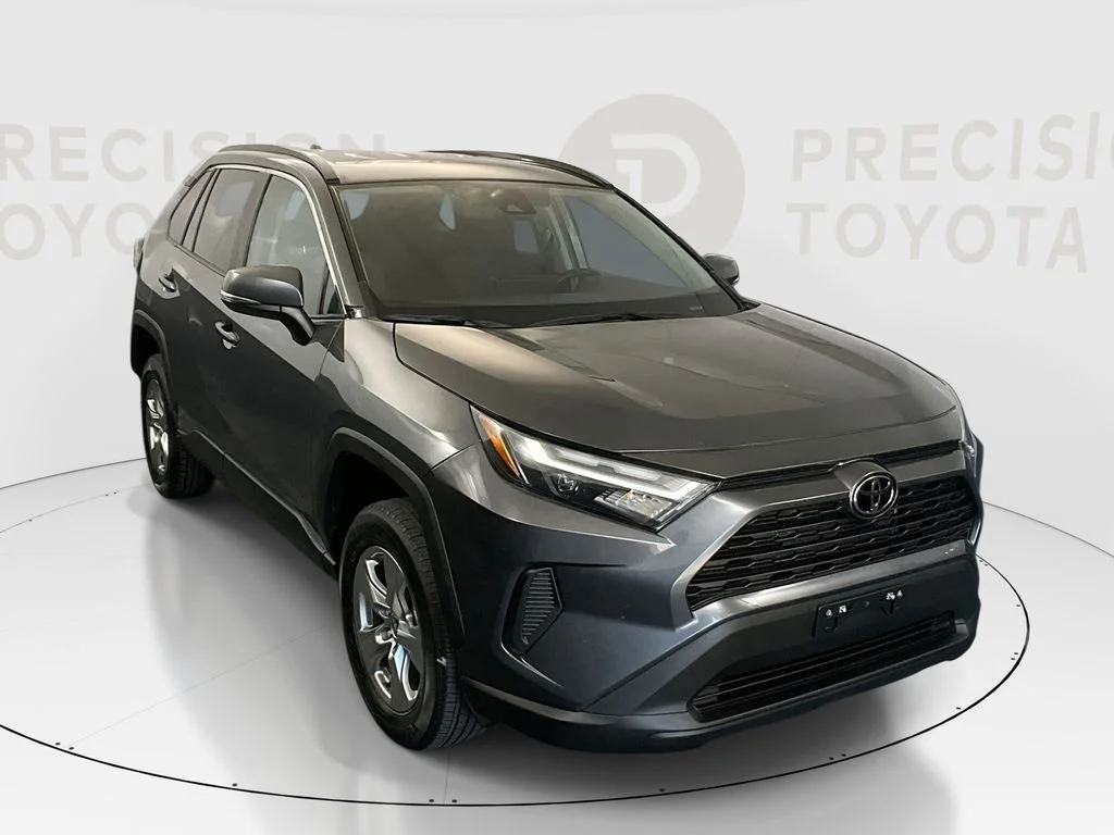 Used 2024 Magnetic Gray Metallic Toyota XLE image 1