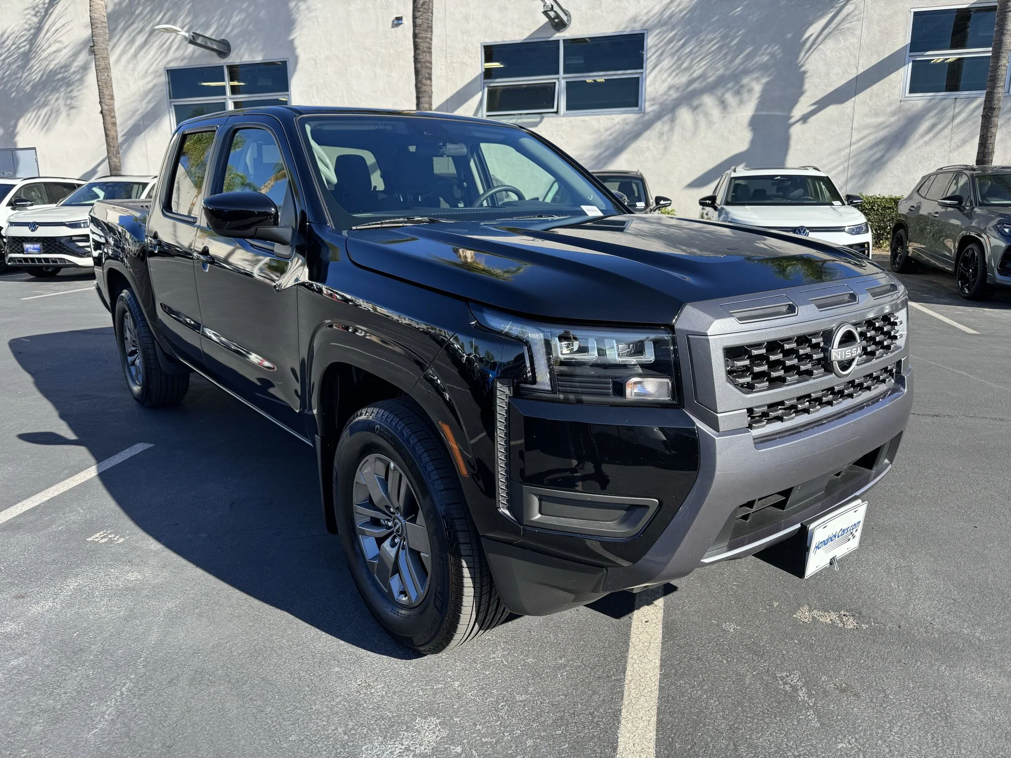 Used 2026 SUPER BLACK Nissan SV image 1