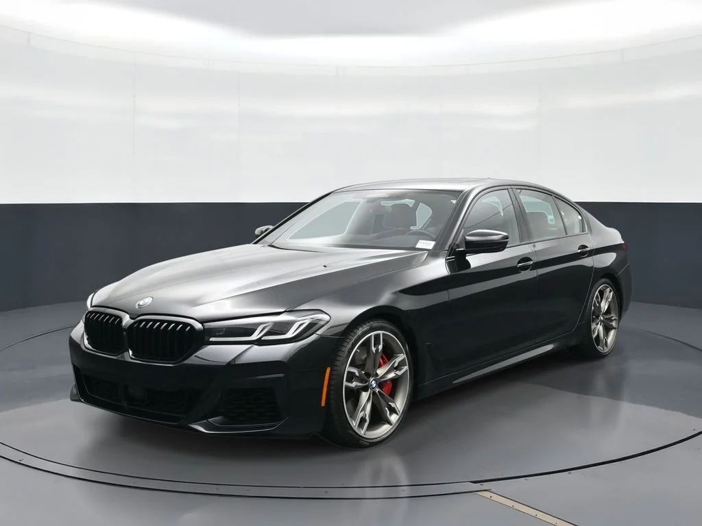 Certified Used 2023 Black Sapphire Metallic BMW M550i xDrive image 1