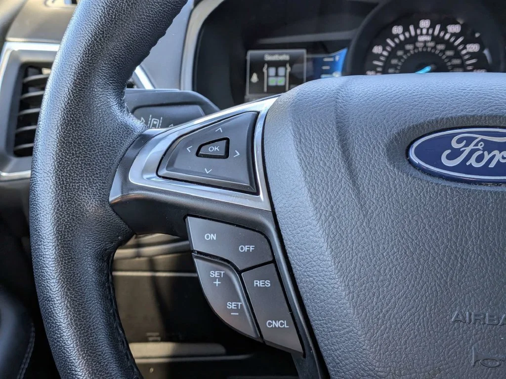 Certified Used 2024 Blue Metallic Ford Titanium image 23