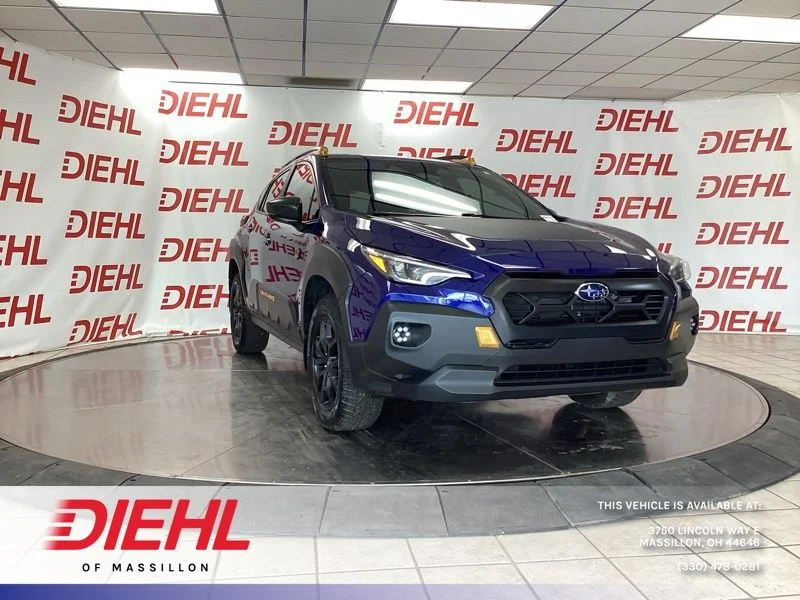 Used 2024 Blue Subaru Wilderness image 1