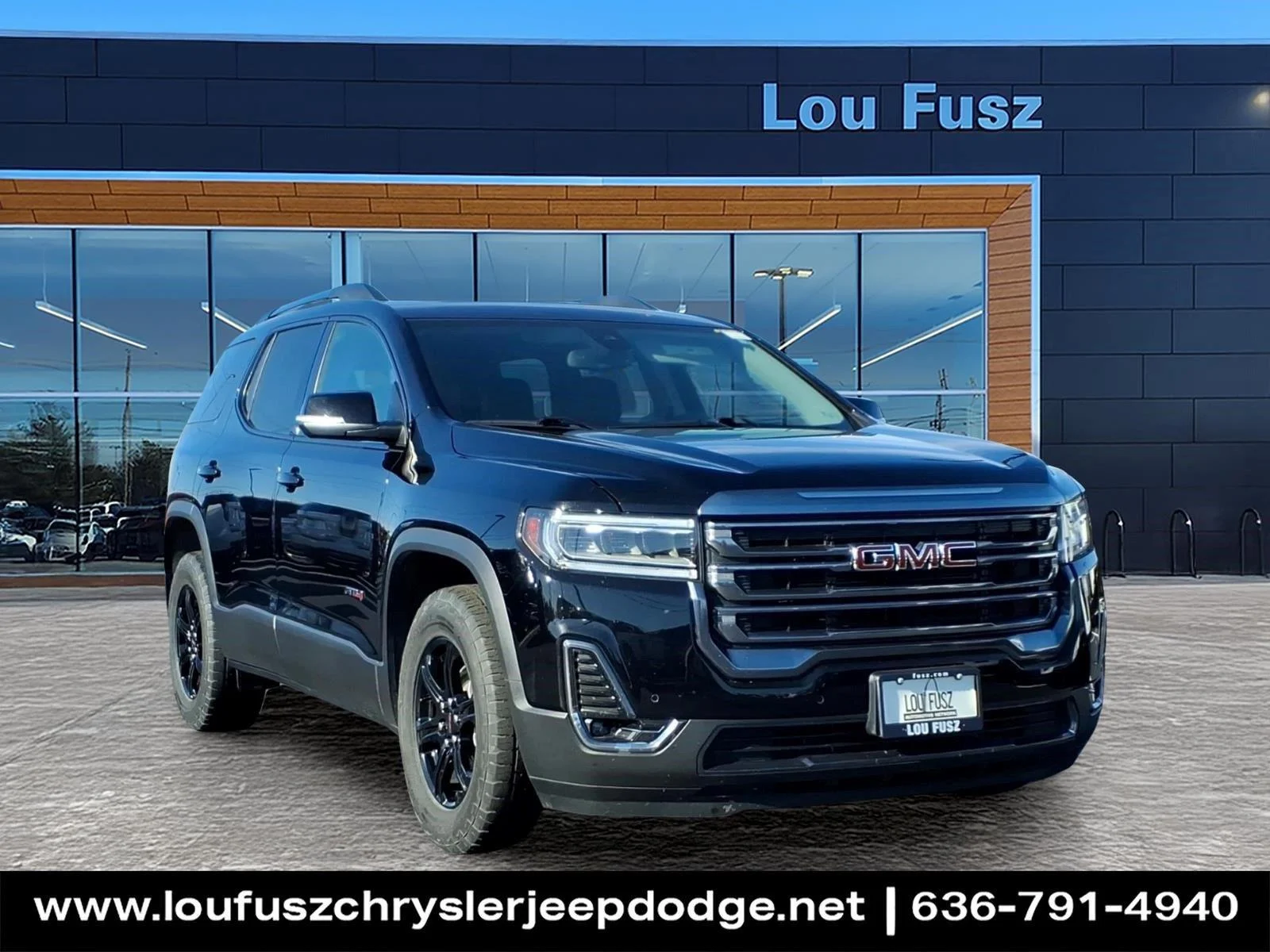 Used 2023 Ebony Twilight Metallic GMC AT4 image 1