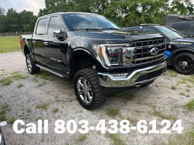 Used 2023 Black Ford Lariat image 1