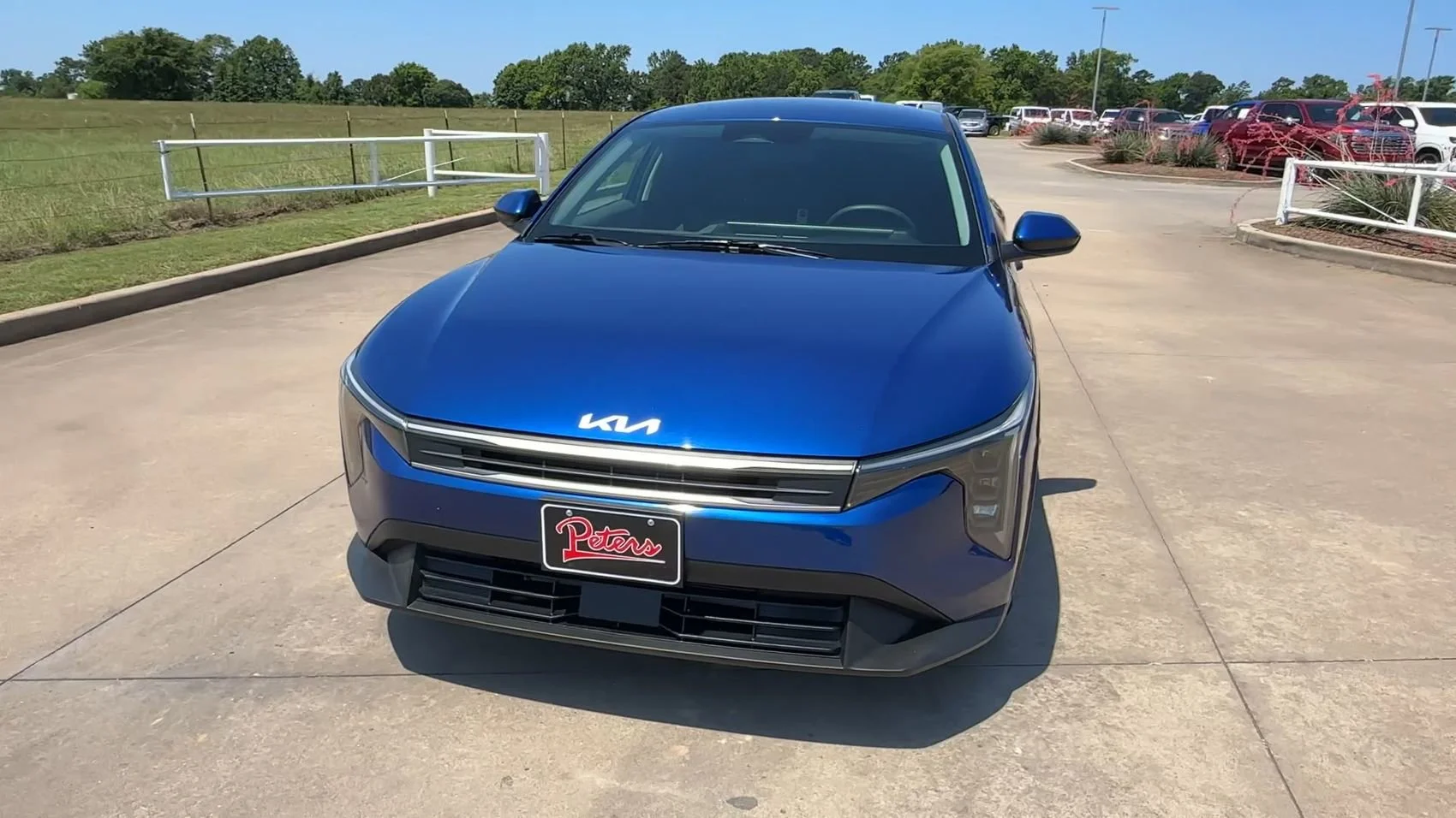 Used 2025 Deep Sea Blue Kia LXS image 4