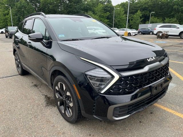 Used 2024 Ebony Black Kia X-Line image 1