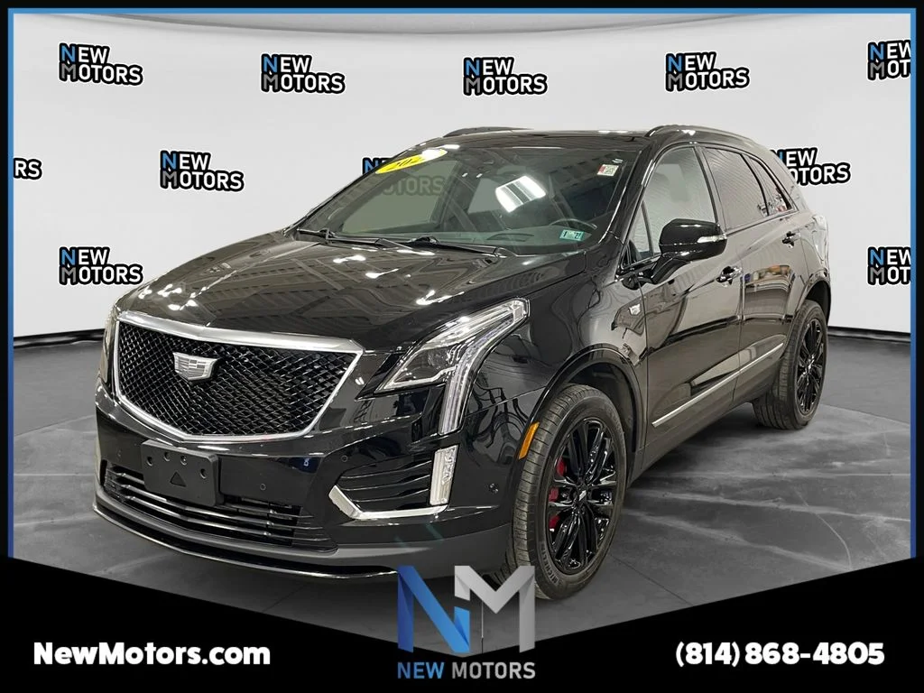 Used 2022 Black Metallic Cadillac Sport image 1