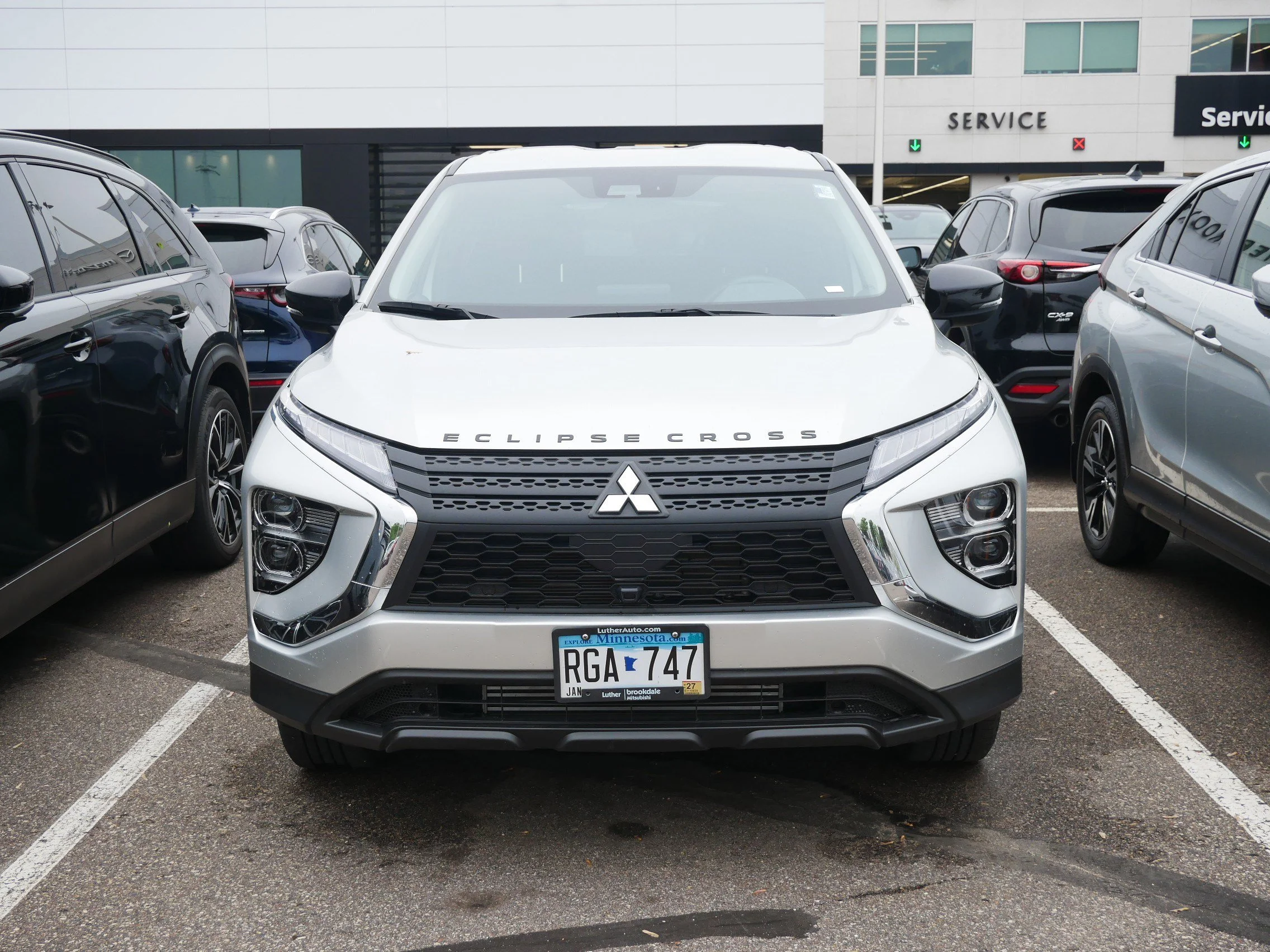 Used 2024 Mitsubishi Eclipse Cross LE with VIN JA4ATVAA4RZ048457 for sale in Brooklyn Center, Minnesota