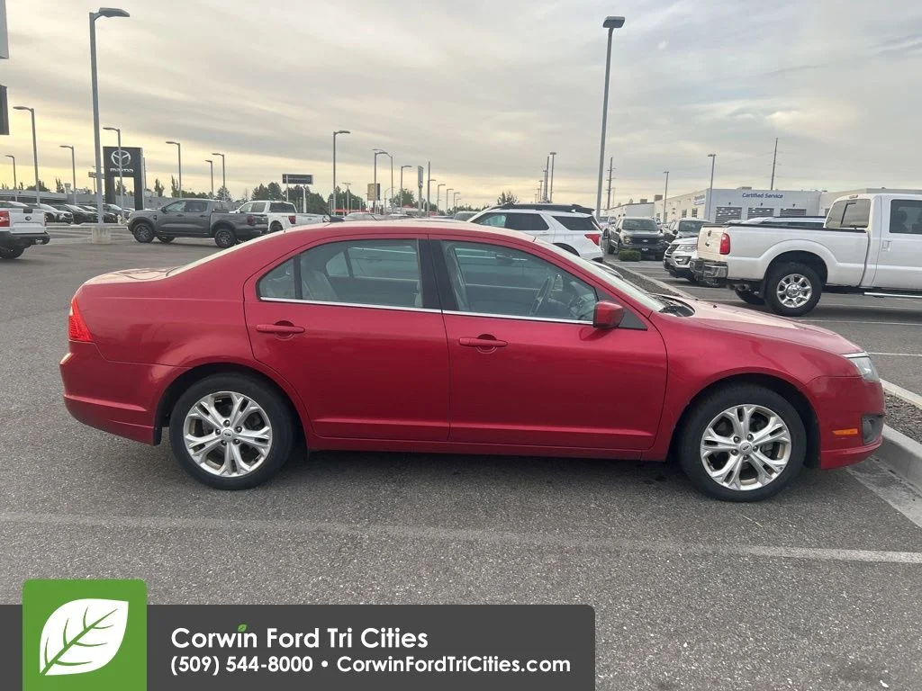 Used 2012 Red Candy Metallic Tinted Clearcoat Ford SE image 8