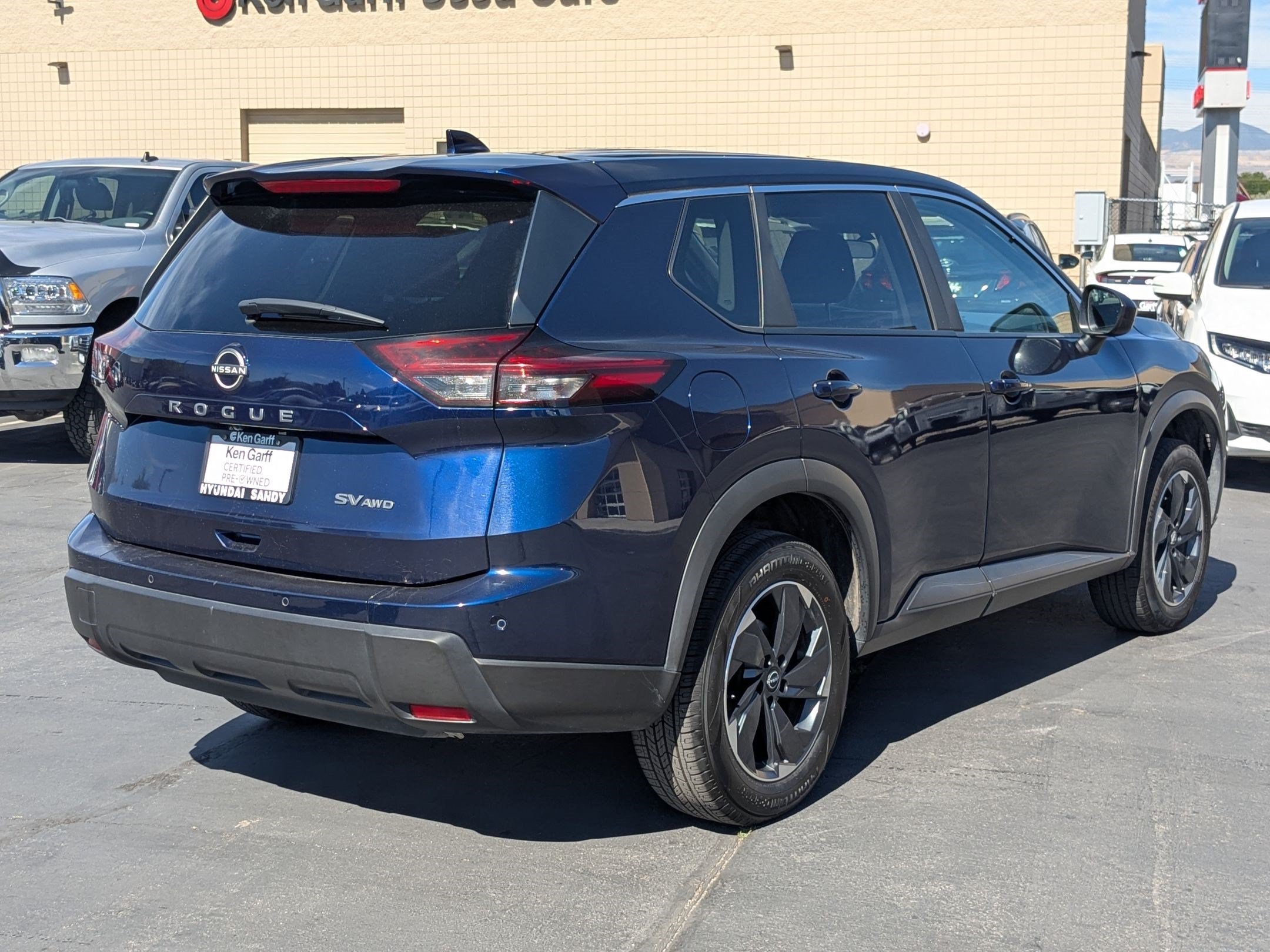 Used 2024 Deep Ocean Blue Pearl Nissan SV image 3
