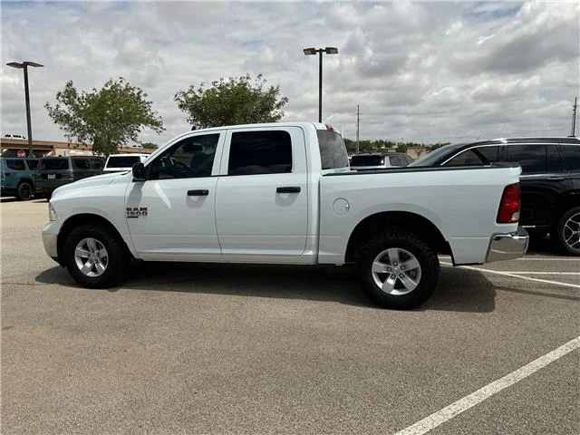 Used 2023 Bright White Clearcoat RAM SLT 4x4 Crew Cab 5.6 ft. box 140 in. WB image 4