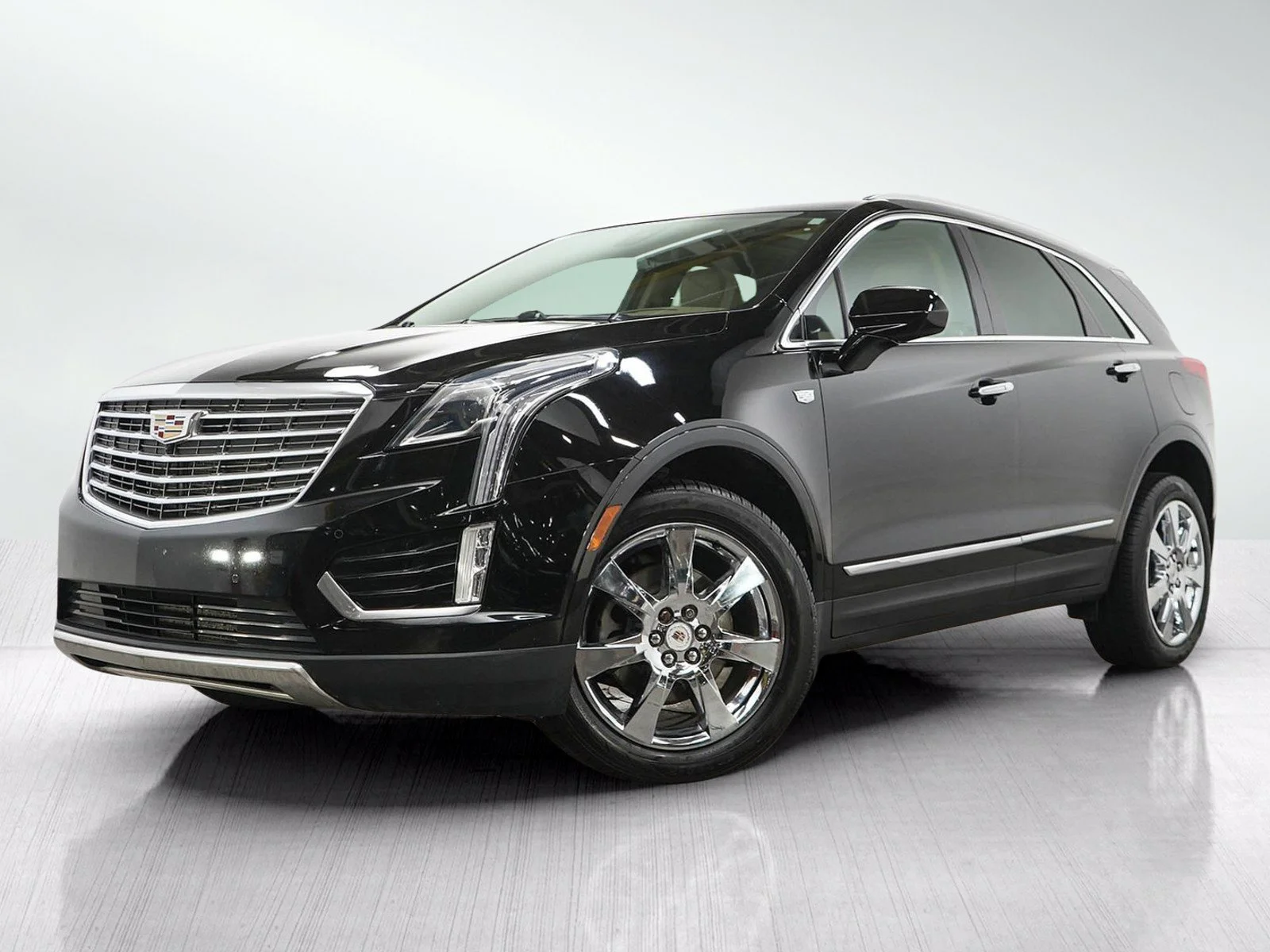 Used 2018 Stellar Black Metallic Cadillac Platinum AWD image 1