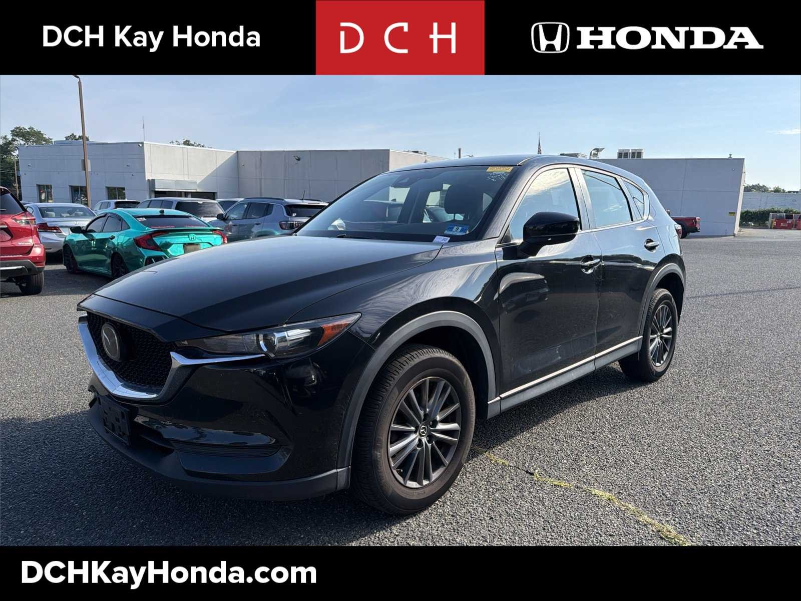 Used 2020 Jet Black Mica Mazda Sport image 1