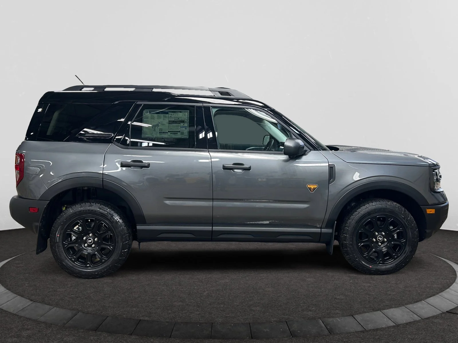 New 2026 Carbonized Grey Metallic Ford Badlands image 6
