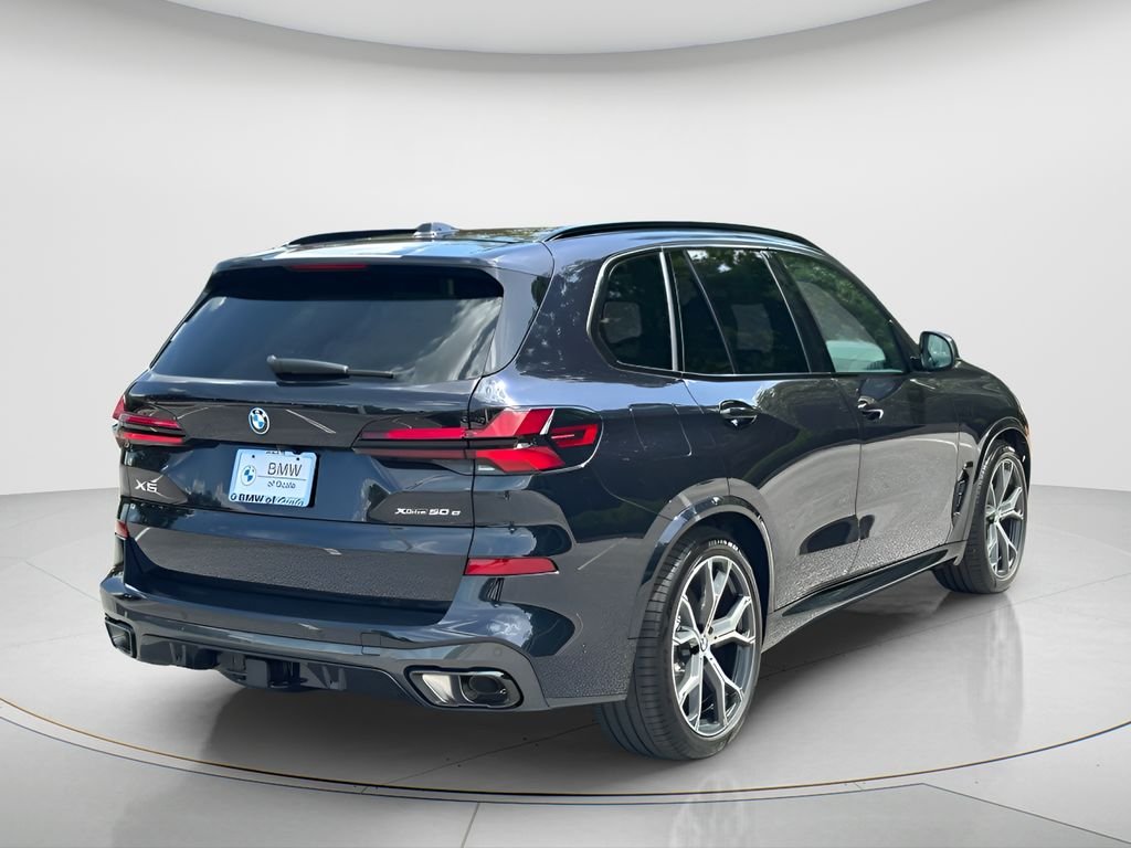 New 2026 Carbon Black Metallic BMW xDrive50e image 5