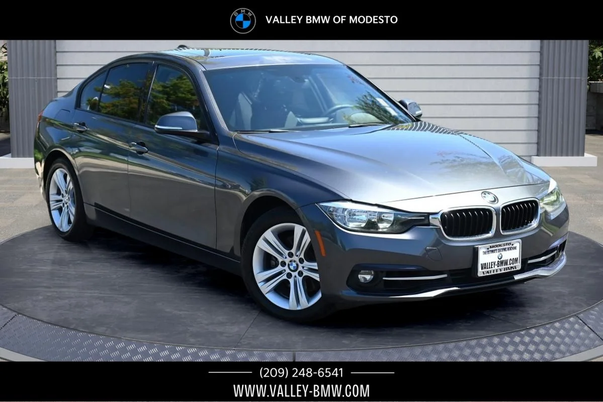 Used 2016 Mineral Grey Metallic BMW 328i image 1