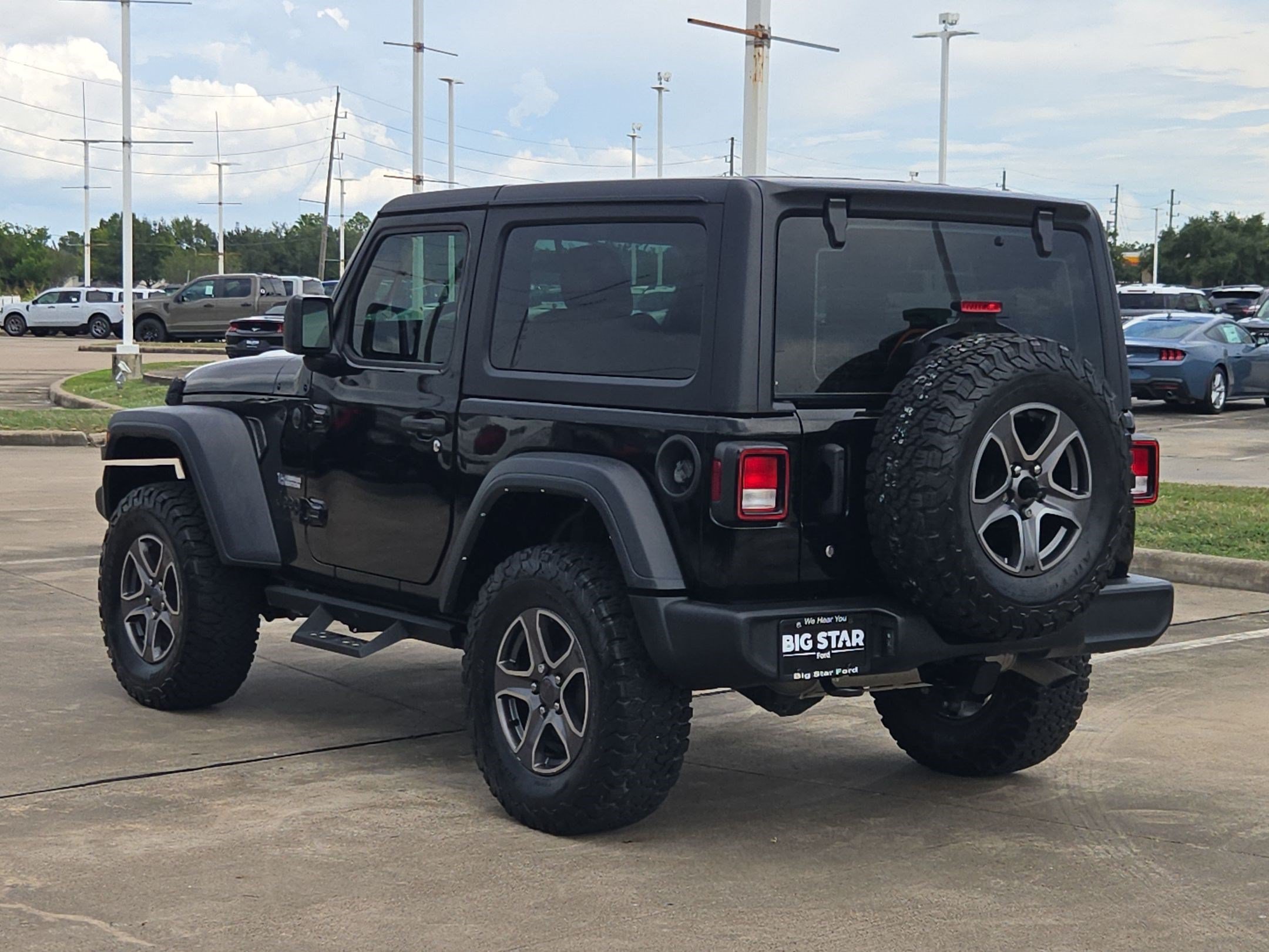 Used 2024 Black Clearcoat Jeep Sport image 5