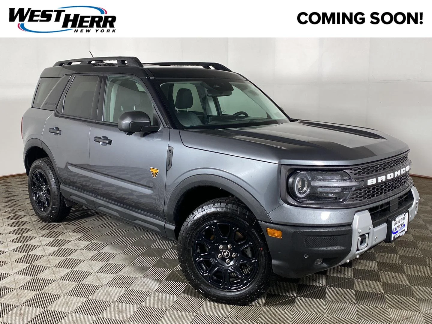 New 2026 Carbonized Gray Metallic Ford Badlands image 1