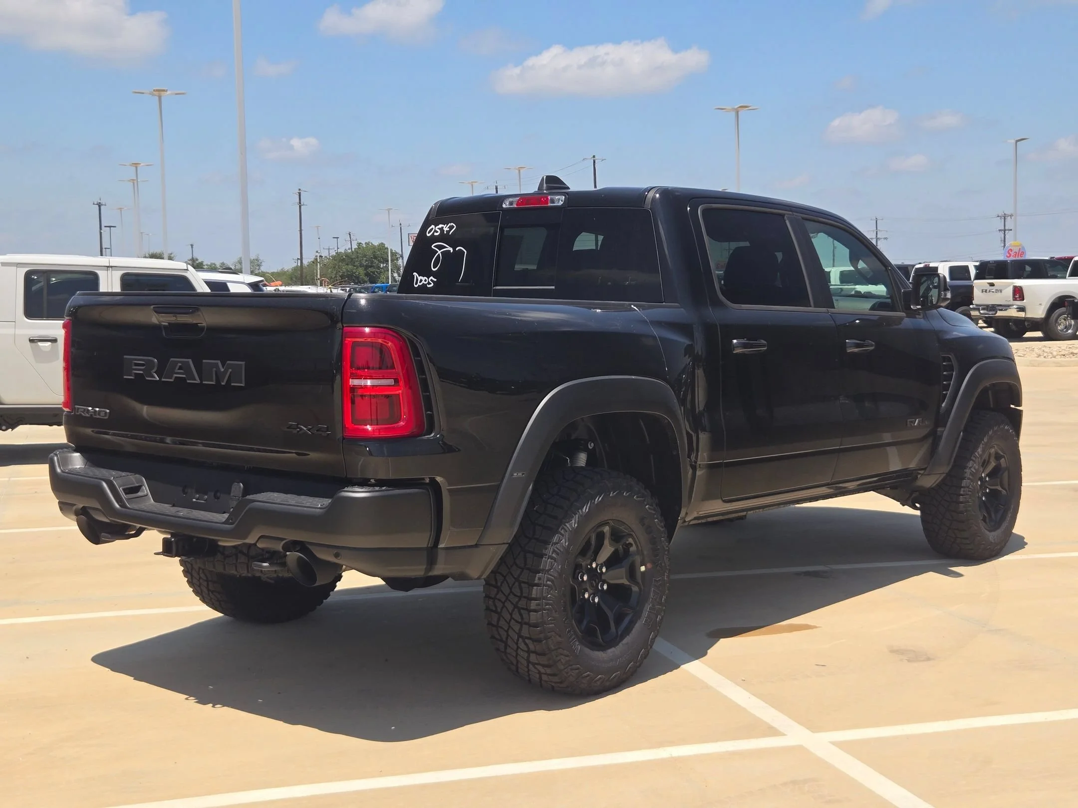 New 2026 Diamond Black Crystal Pearl-Coat Exterior Paint RAM RHO image 3