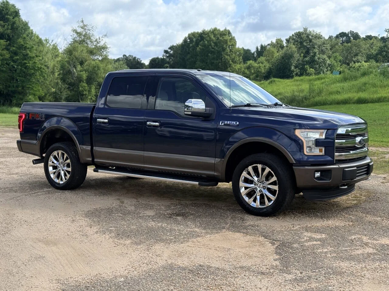 Used 2015 Blue Ford Lariat 4x4 4dr SuperCrew 5.5 ft. SB image 7