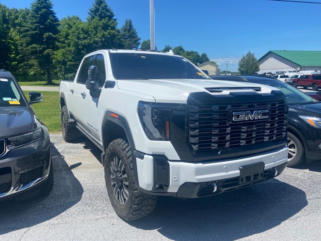 Used 2025 Summit White GMC Denali Ultimate image 1