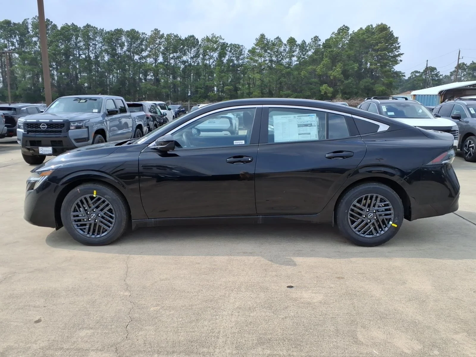 2026 Nissan Sentra SV Black at Robbins Nissan