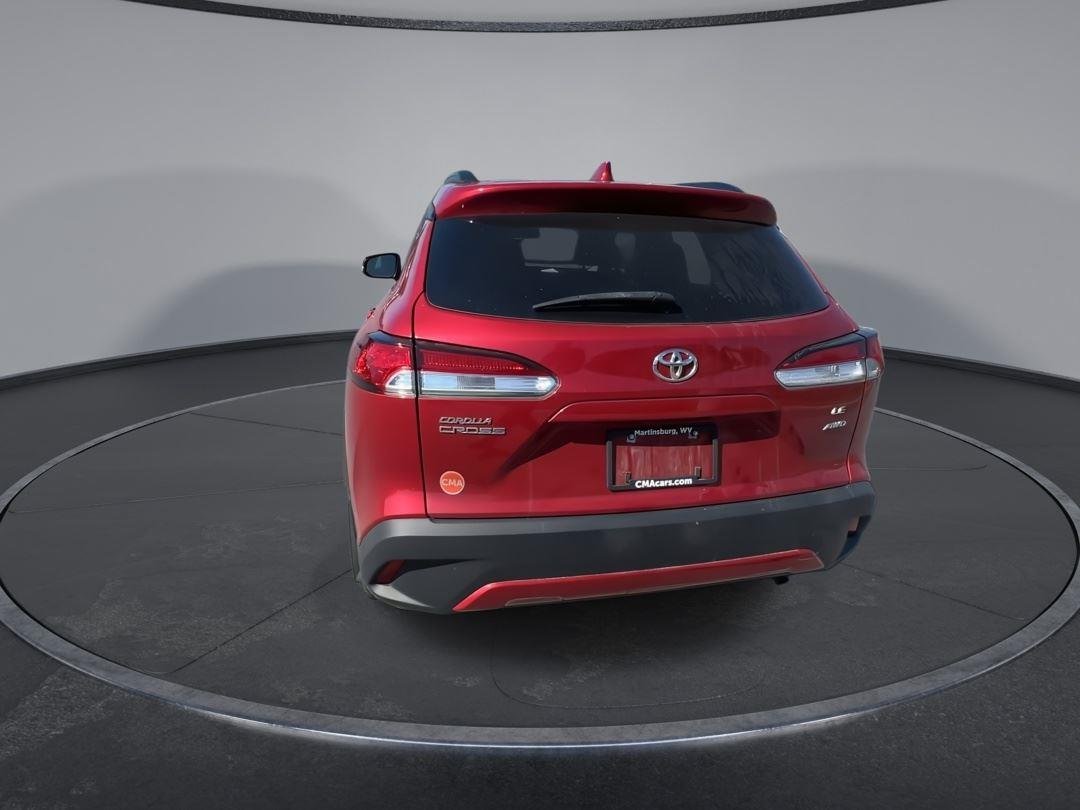 Used 2023 Barcelona Red Metallic Toyota LE image 7