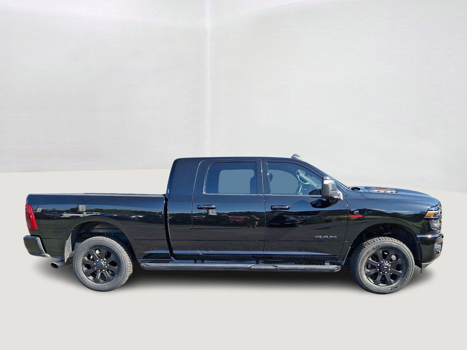 Used 2025 Diamond Black Crystal Pearlcoat Ram Laramie image 7