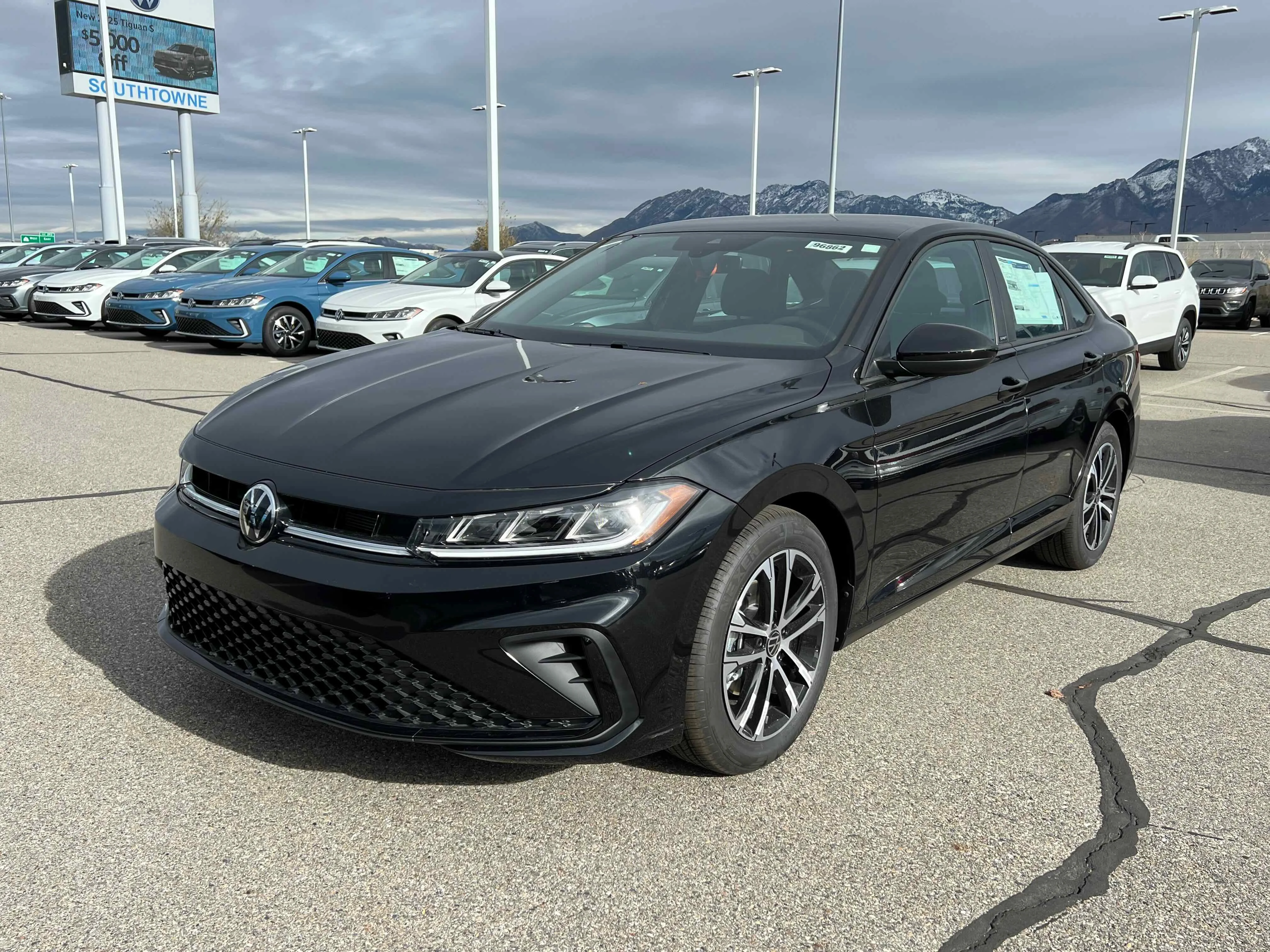 New 2026 Deep Black Volkswagen Sport image 1