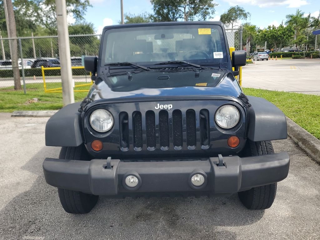 Used 2010 Jeep Wrangler Sport with VIN 1J4AA2D17AL167952 for sale in Pembroke Pines, FL