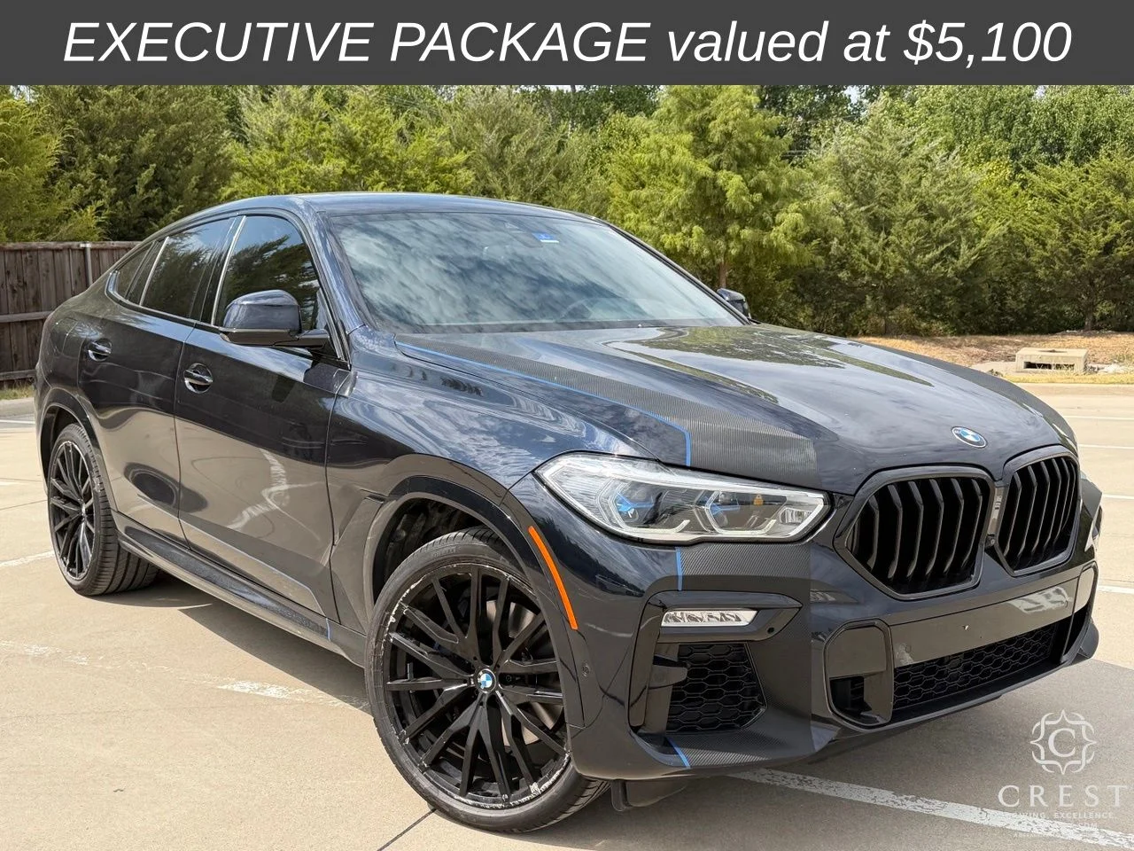 Used 2021 Carbon Black Metallic BMW xDrive40i image 1