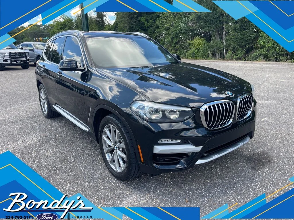 Used 2019 Black BMW sDrive30i image 1