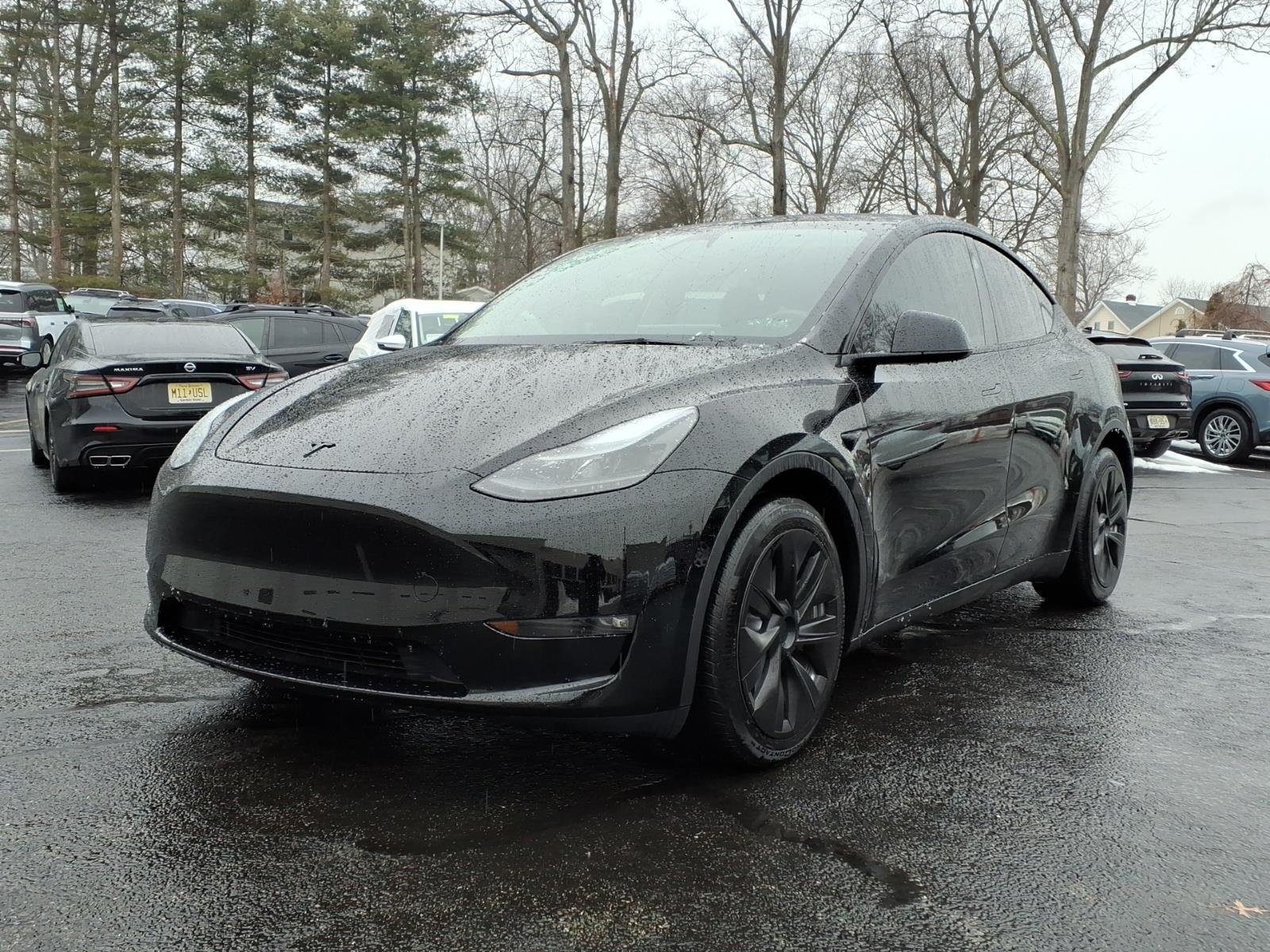 Used 2024 Tesla Model Y Long Range with VIN 7SAYGAEE2RF021877 for sale in Summit, NJ