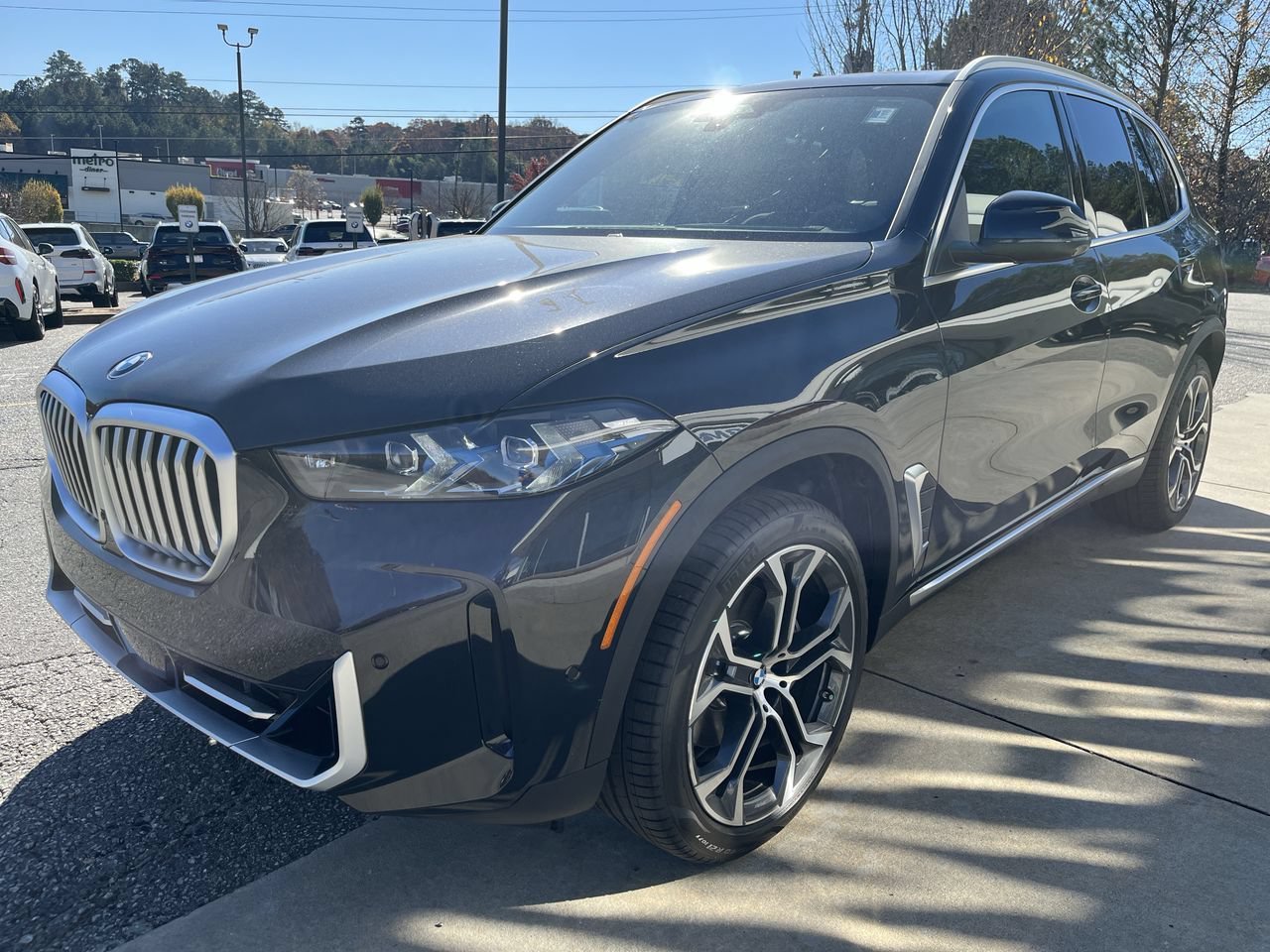 Used 2026 Black Sapphire Metallic BMW sDrive40i image 4