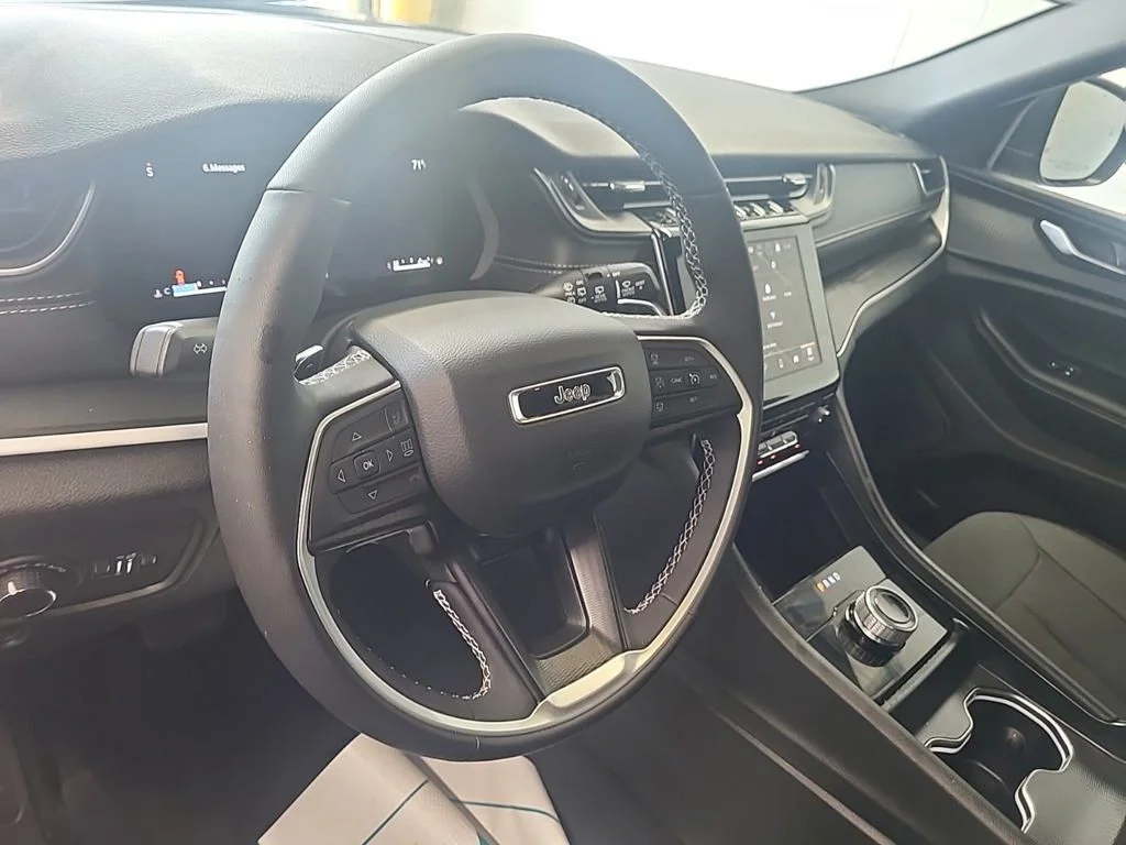 Used 2025 Gray Jeep Laredo image 3