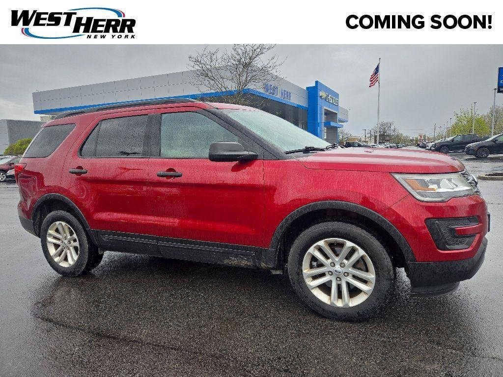 Used 2017 Ruby Red Metallic Ford  image 1