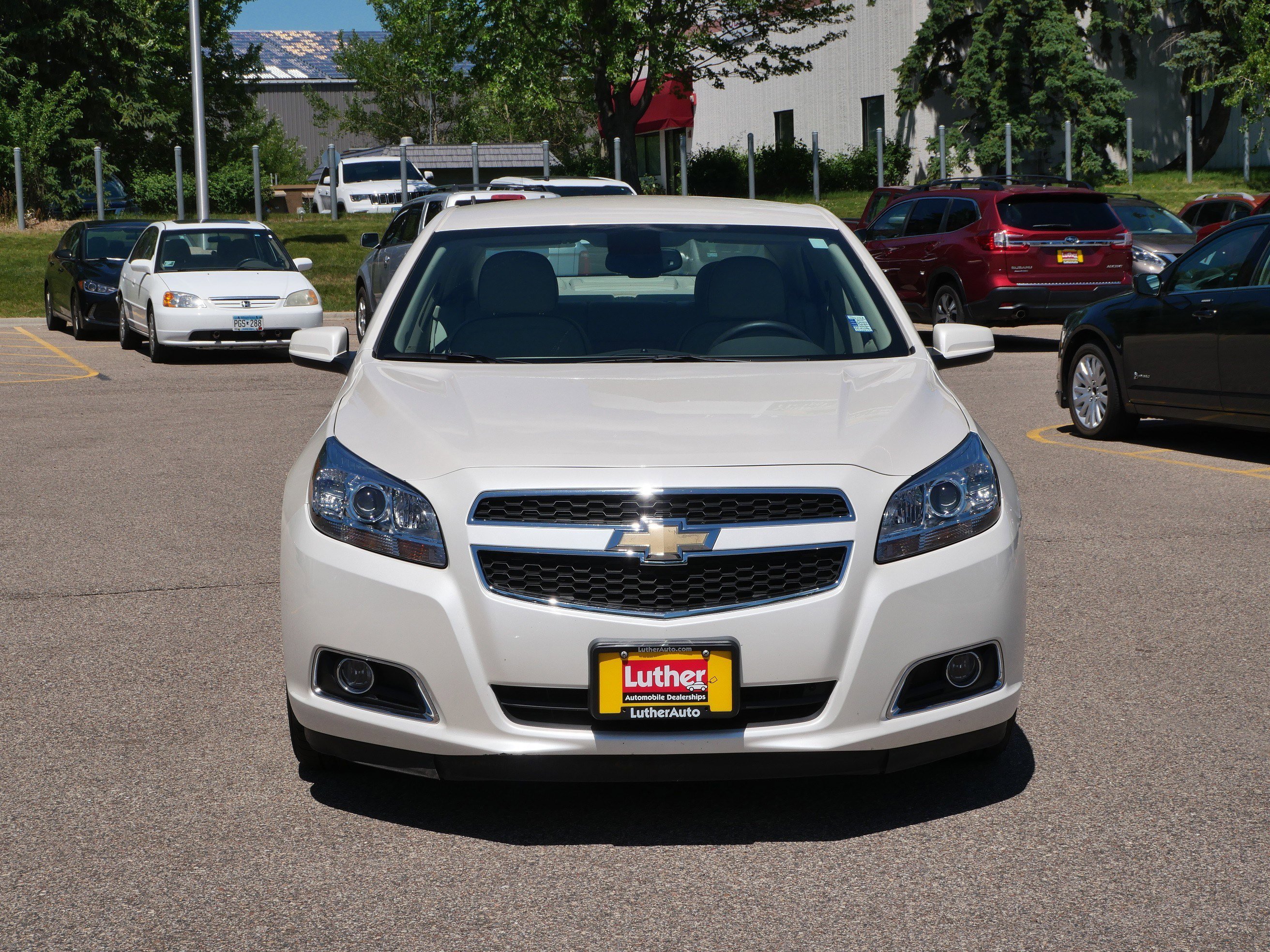Used 2013 White Diamond Tricoat Chevrolet ECO image 2