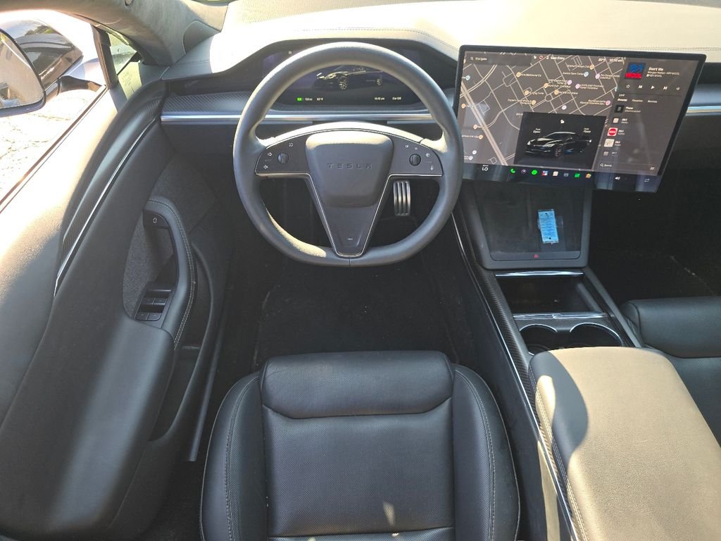 Used 2024 Solid Black Tesla Plaid image 19