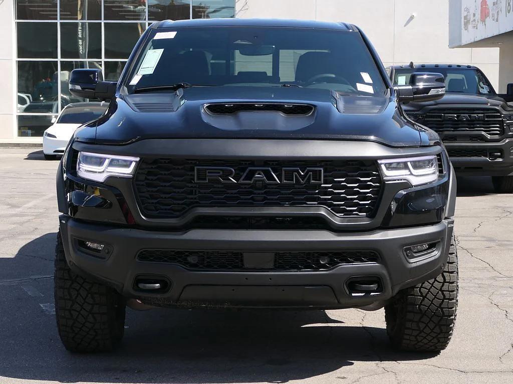 New 2026 Diamond Black Crystal Pearl Coat RAM RHO Crew Cab 4x4 5