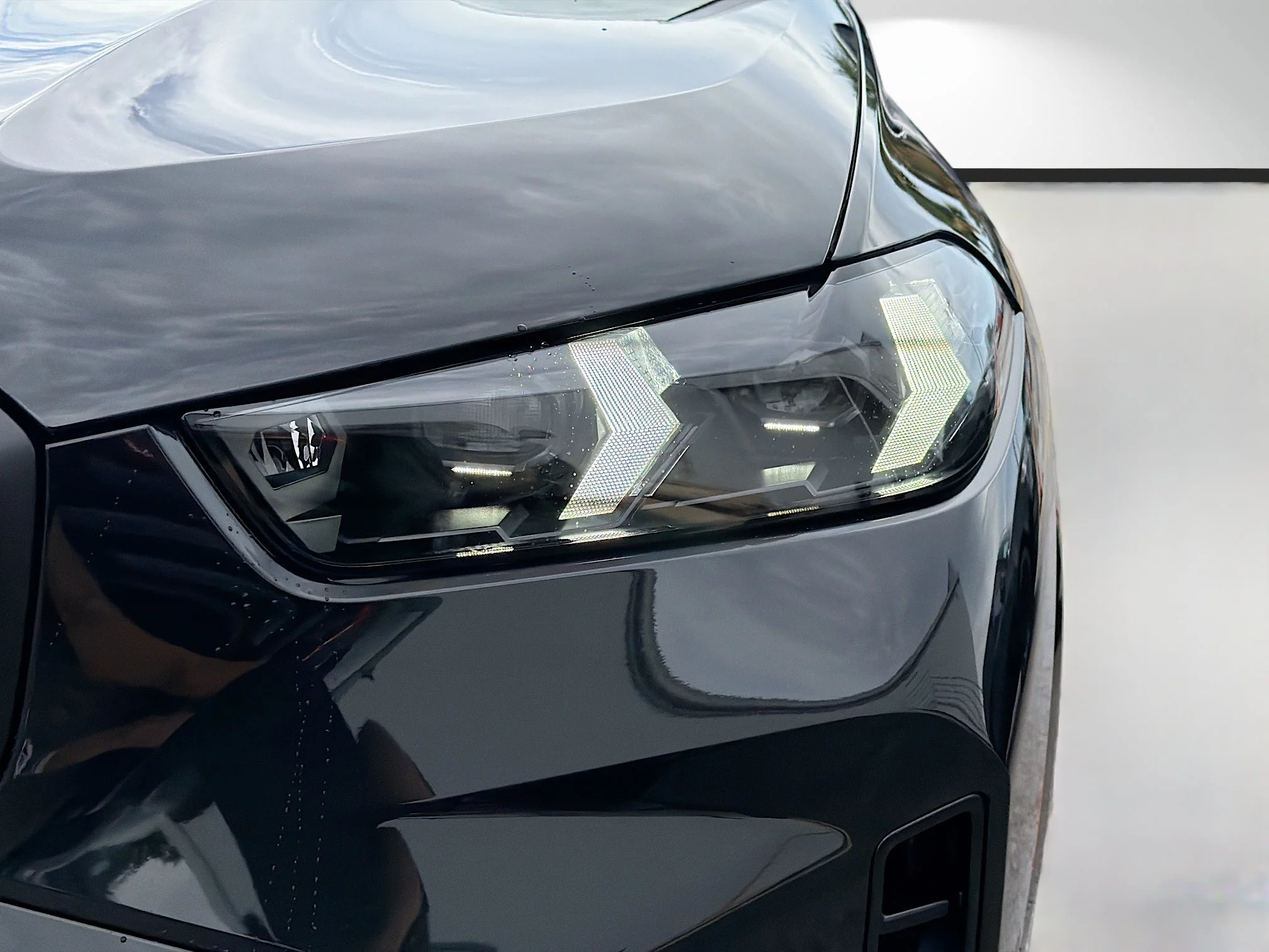 New 2026 Black Sapphire Metallic BMW xDrive50e image 9