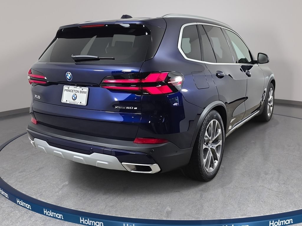 New 2026 Tanzanite Blue II Metallic BMW xDrive50e image 5