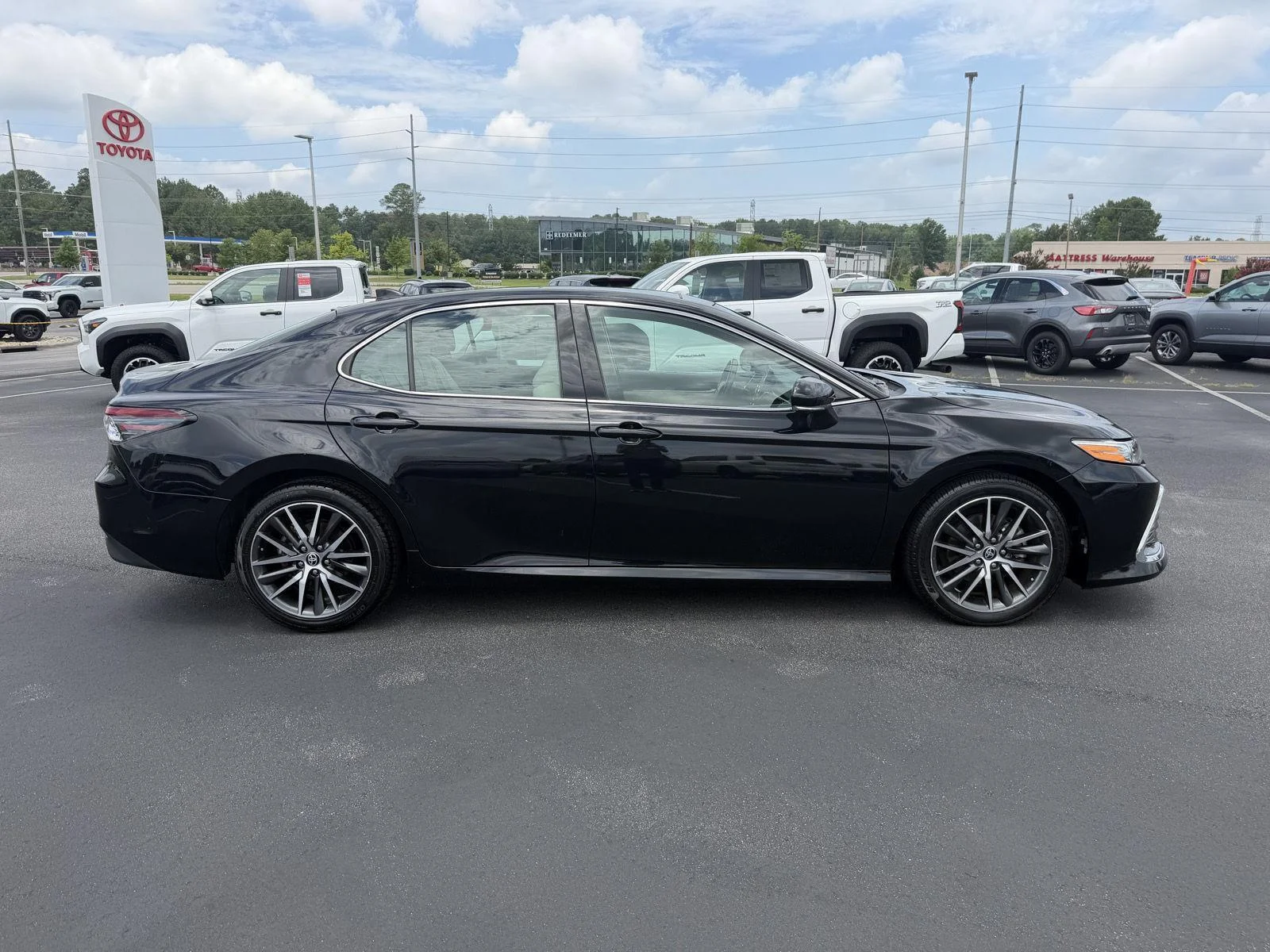 Used 2023 Midnight Black Metallic Toyota XLE image 8