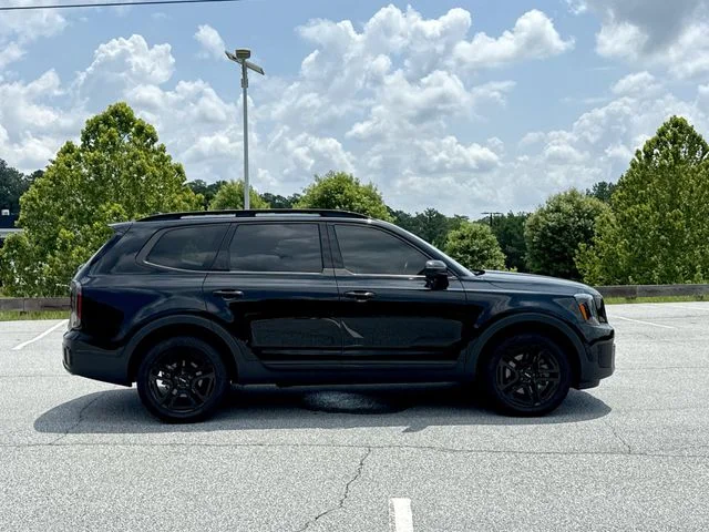 Used 2024 Black Kia EX X-Line image 5