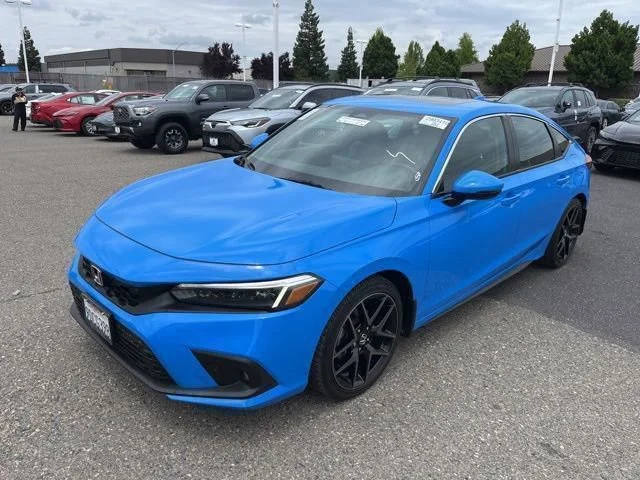 Used 2022 Boost Blue Pearl Honda Sport Touring image 1