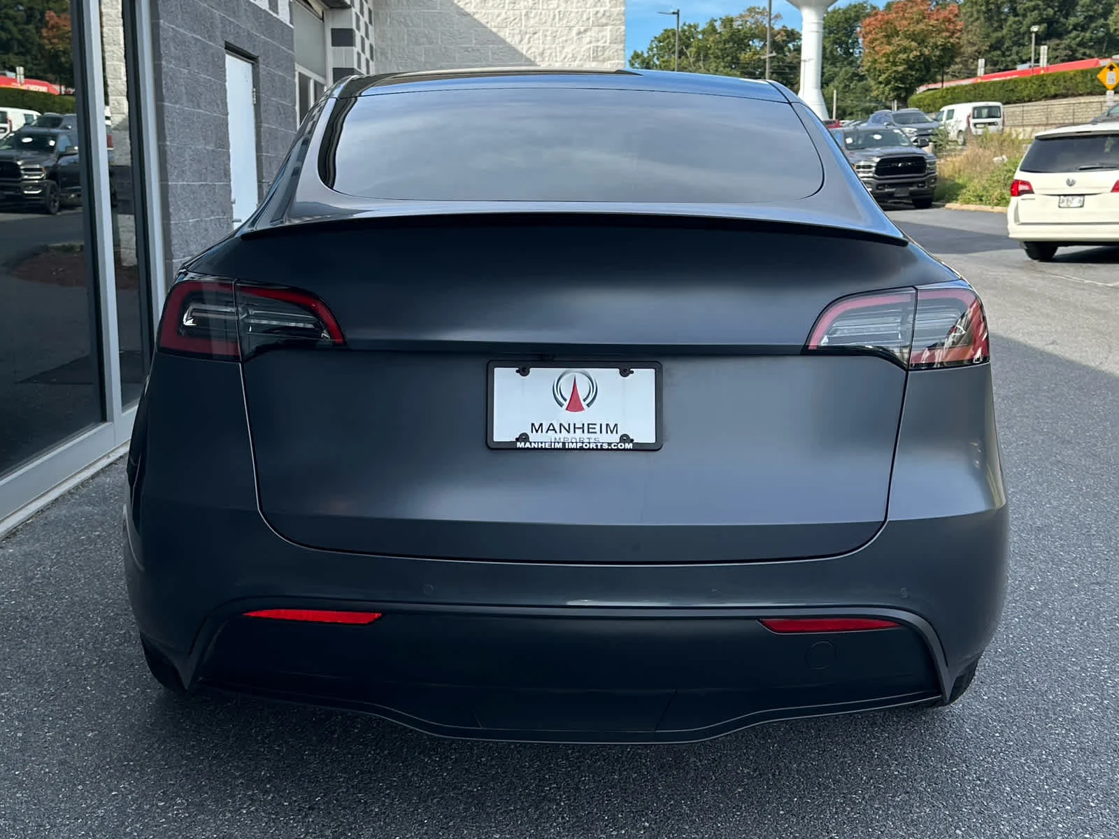 Used 2022 Solid Black Tesla Performance image 5