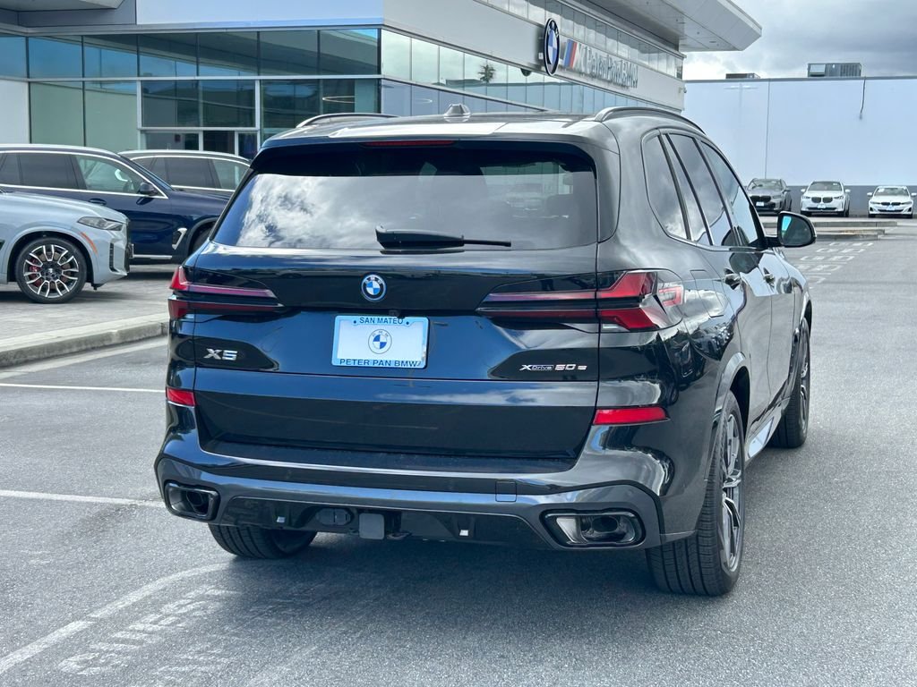 New 2026 Black Sapphire Metallic BMW xDrive50e image 5